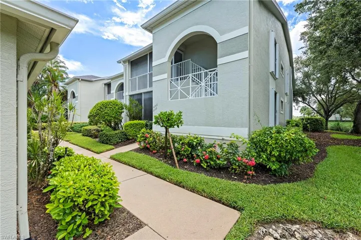 View of home's exterior with a lanai