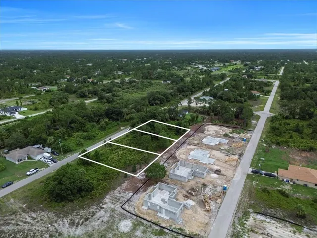 Aerial view of property's location with nearby suburban area and property boundaries highlighted