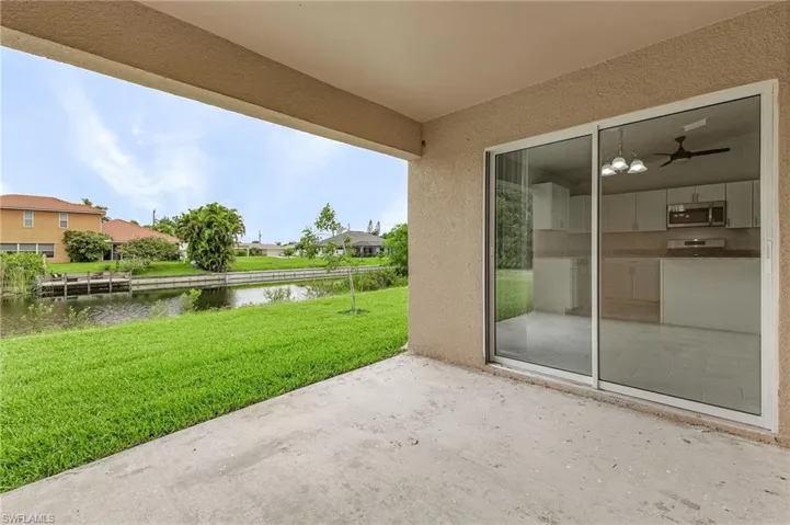 View of patio featuring a water view