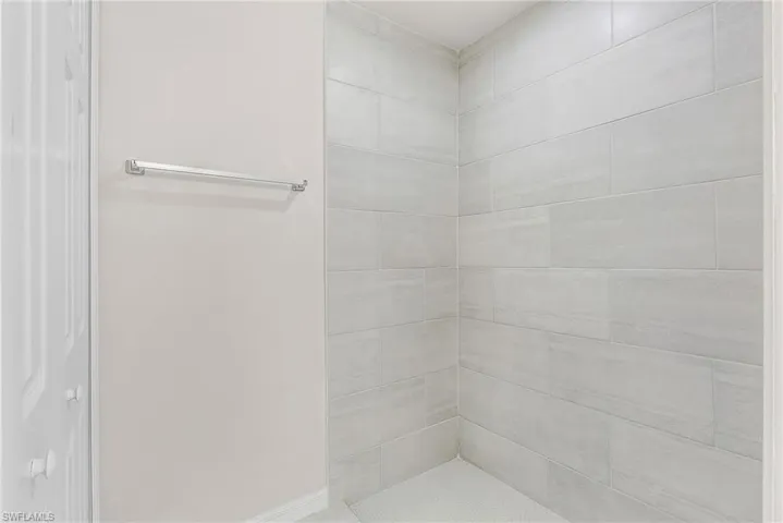 Bathroom featuring tiled shower