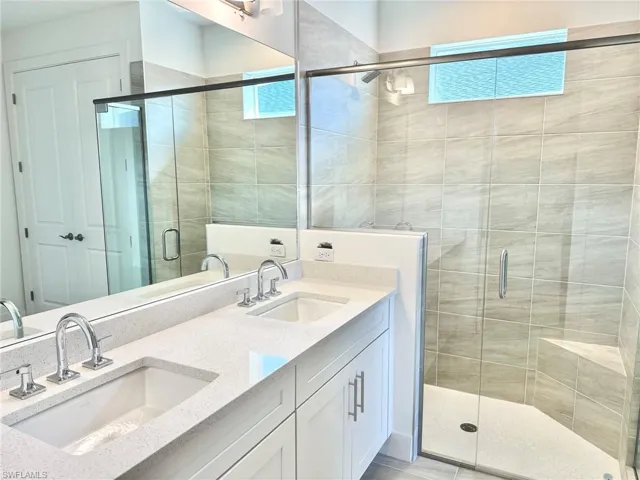 Primary bathroom with luxe, walk-in shower