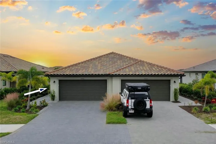 Tile roof and a two car garage!