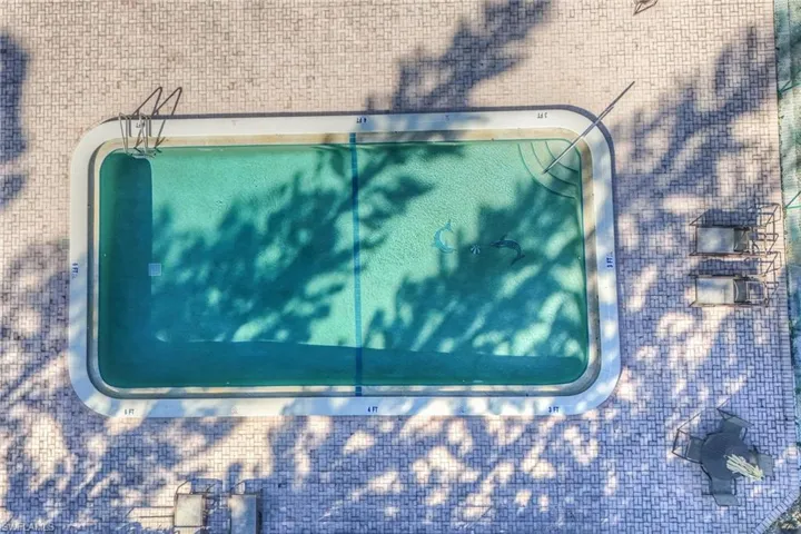 Drone / aerial view of a pool area