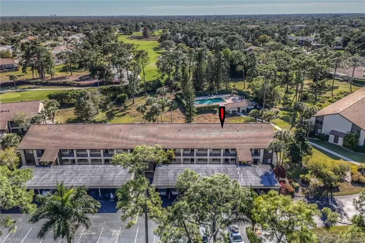 Aerial perspective of suburban area with a golf club
