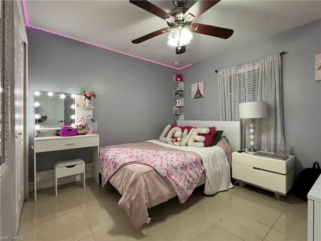 Bedroom featuring ceiling fan