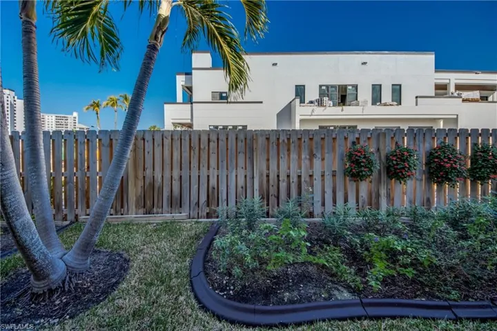 View of fenced backyard