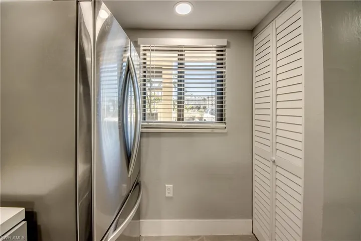 Laundry room featuring baseboards