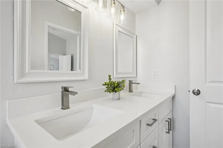 Bathroom featuring double vanity