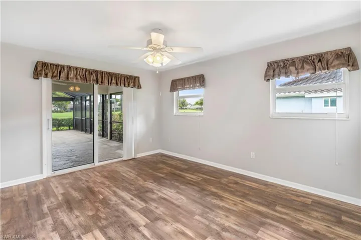 Bedroom with slider to lanai/pool
