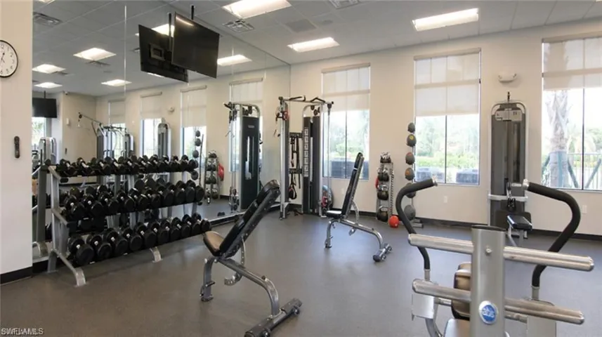 Exercise room with a paneled ceiling