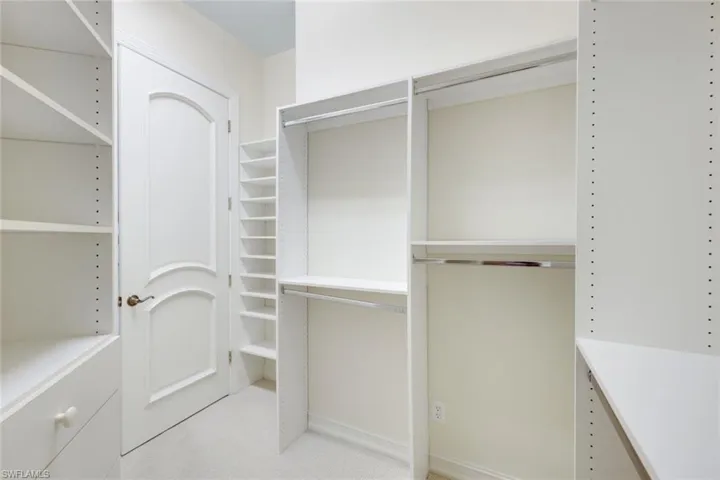 One of two Master bedroom closets with organizer