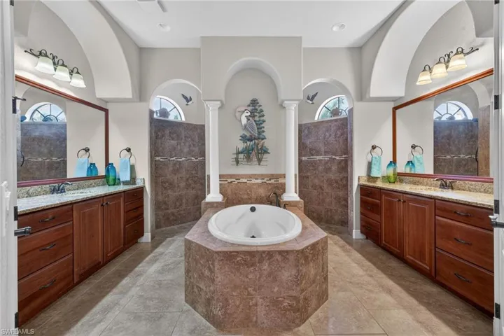 Walk through shower with two shower heads