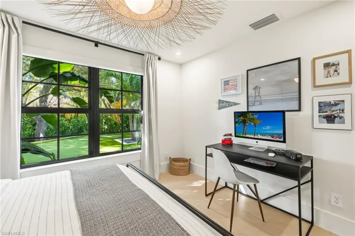 Bedroom featuring a desk and recessed lighting