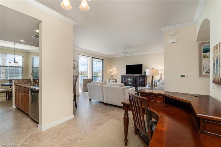 Nice desk and cabinetry in office space