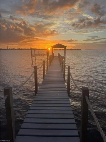 Dock featuring a water view