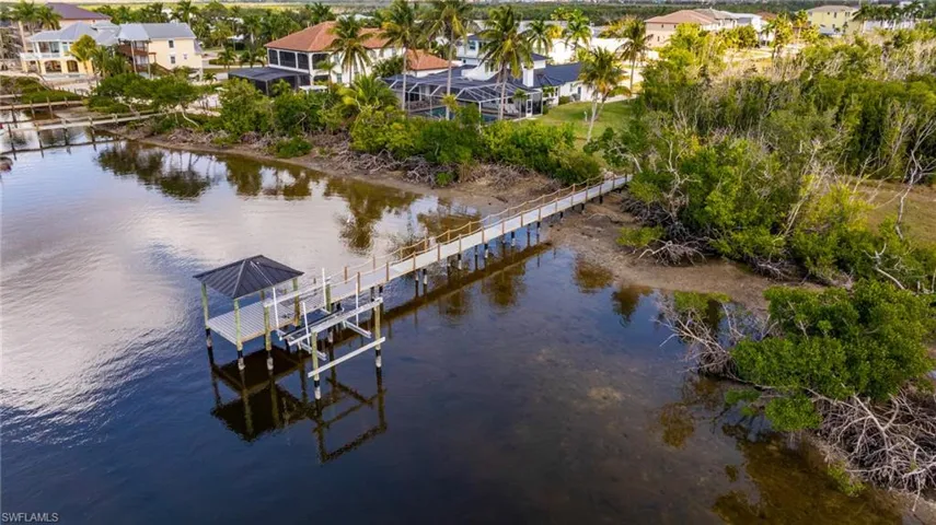 Aerial view of residential area with a nearby body of water