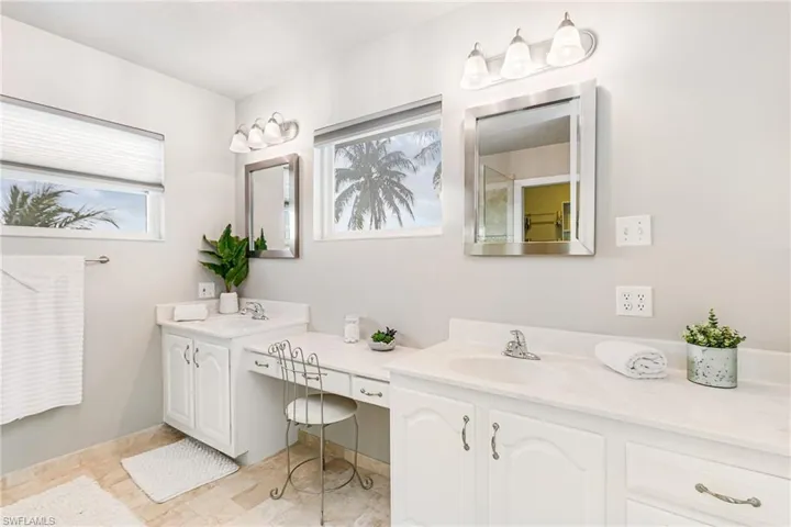 Full bathroom featuring double vanity