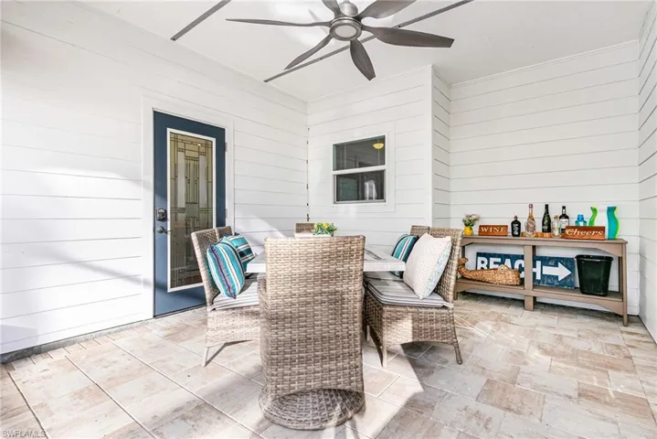 View of patio featuring ceiling fan and outdoor dining space