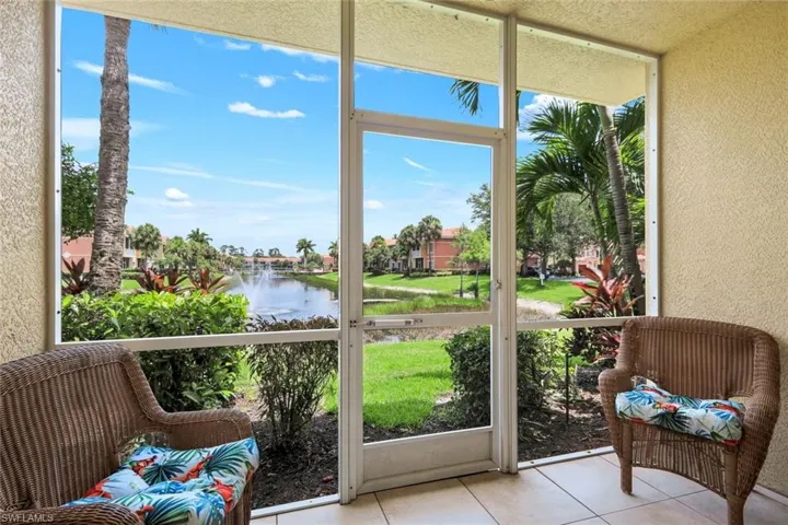 Screened outdoor living area with tile flooring