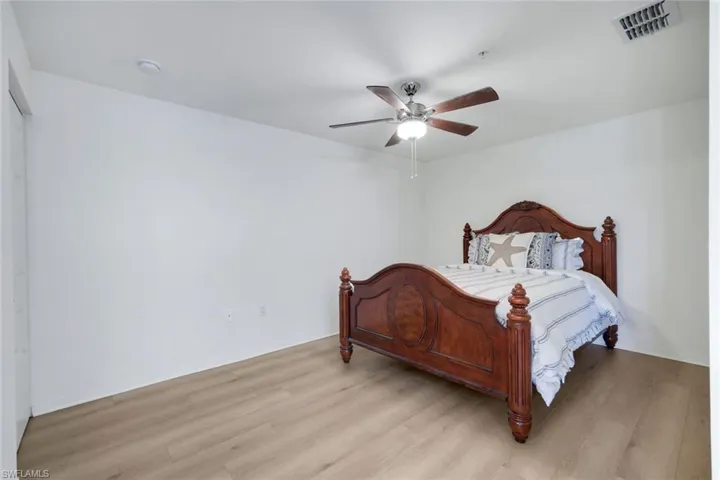 Neutral wall finishes with wood-finish flooring