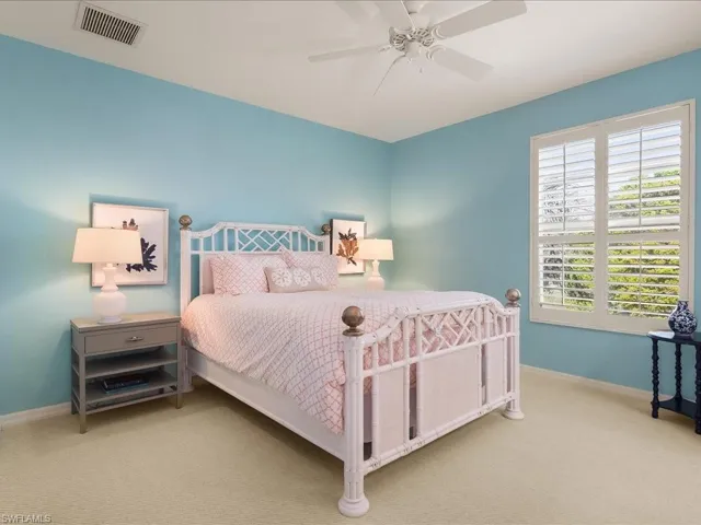 Bedroom featuring carpet flooring and ceiling fan