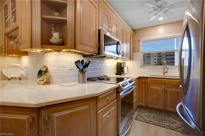 Kitchen has been opened to provide more counter space, cabinets, and room!