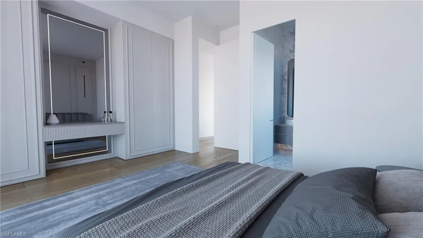 Rendering-Bedroom featuring light wood-style flooring and ensuite bath