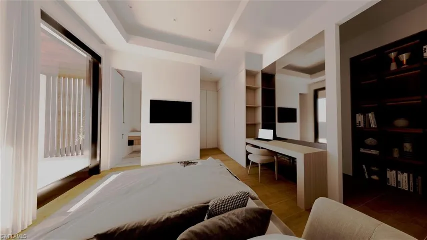 Rendering-Bedroom featuring a raised ceiling, built in desk, and ensuite bathroom