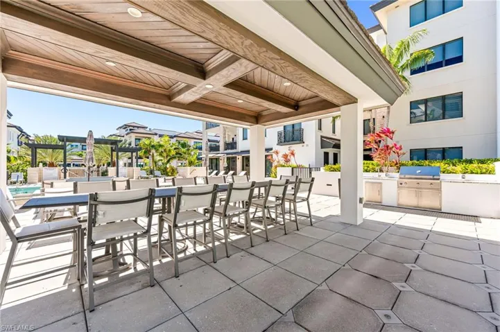 Naples III grills with covered dining area