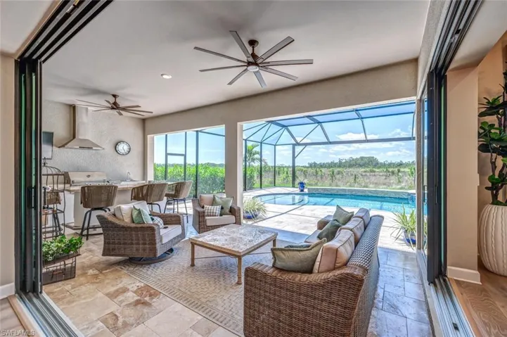 Tiled living room with ceiling fan