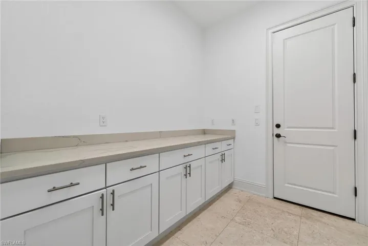 Washroom featuring baseboards