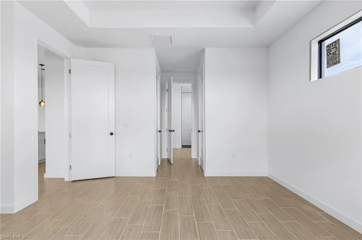 Spare room featuring light wood-type flooring