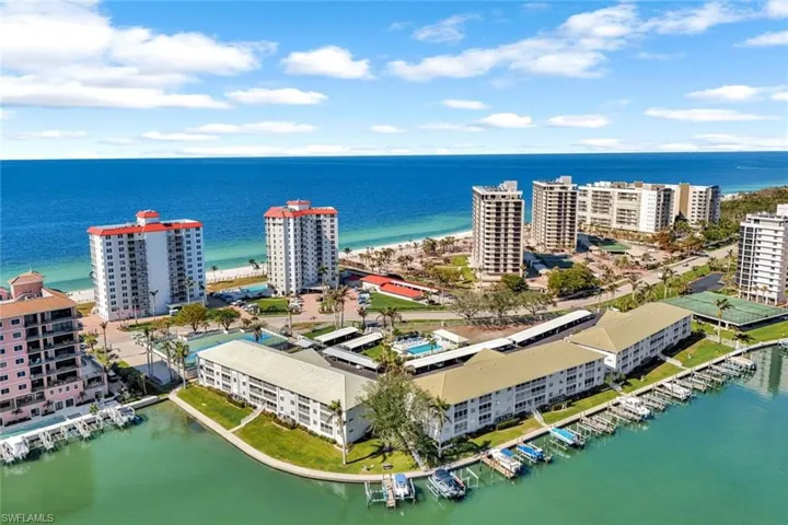 Bird's eye view featuring a beach view and a water view