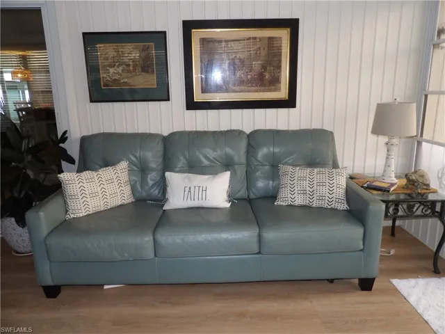 Living room featuring wood finished floors