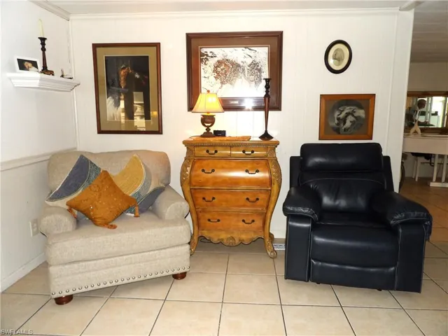 Sitting room featuring tile patterned floors