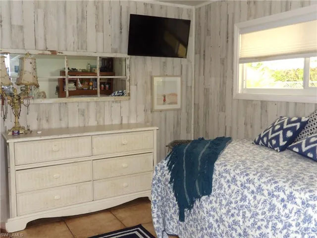 Bedroom featuring tile patterned flooring