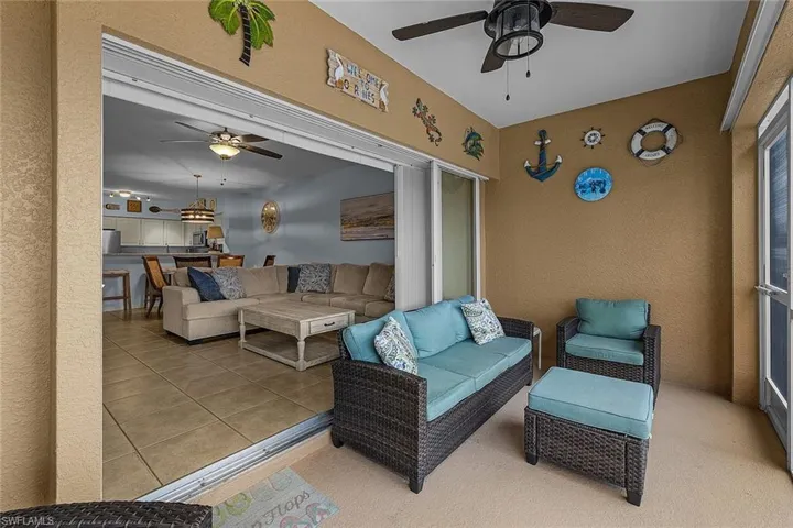 View of patio featuring ceiling fan and outdoor lounge area