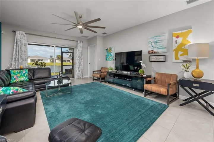 Tiled living room with ceiling fan