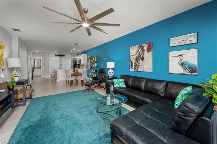 Living room with view of dining room and kitchen