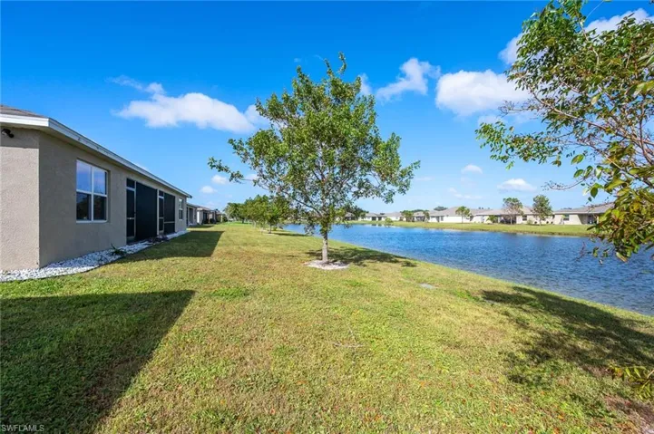 View of lake and backyard