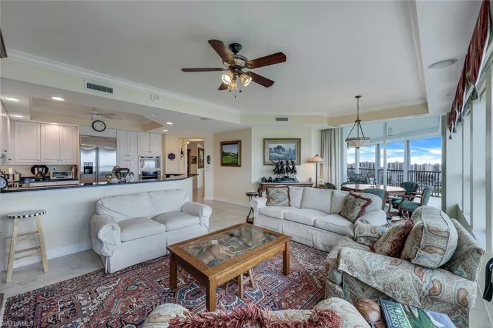 Family room and kitchen with view onto the large lanai.