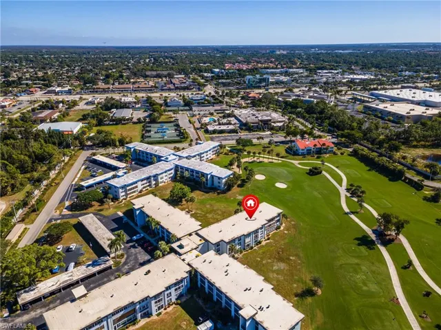 Expansive golf course frontage with mature trees