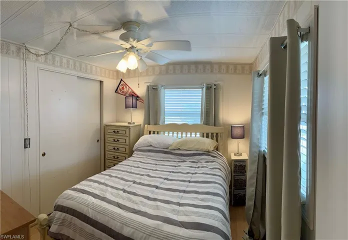 Bedroom featuring , a closet, and ceiling fan