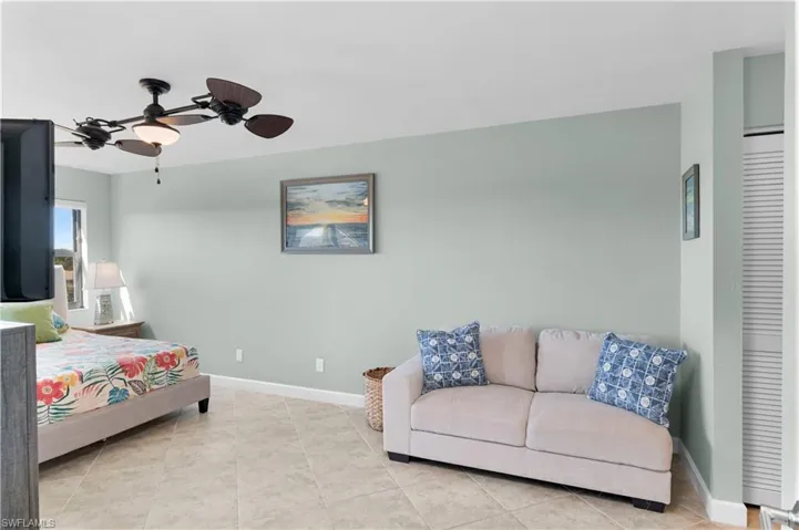 Love seat, tall dresser with Smart TV