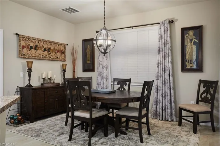 Dining area featuring a chandelier