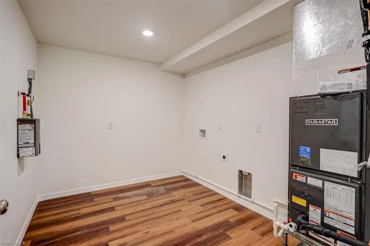 Laundry room/Pantry featuring heating unit
