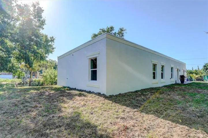 View of home's exterior featuring stucco siding