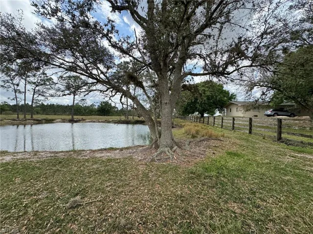 Water view with fence