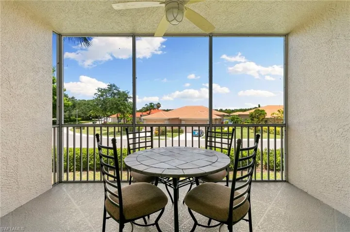 Sunroom / solarium with ceiling fan and plenty of natural light