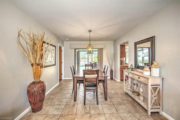 Dining area featuring an inviting chandelier